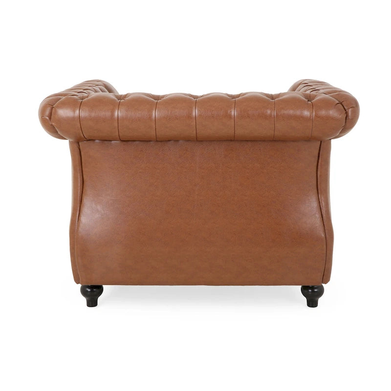 Sillón club de estilo Chesterfield con capitoné de botones, brazos enrollados y ribete de tachuelas