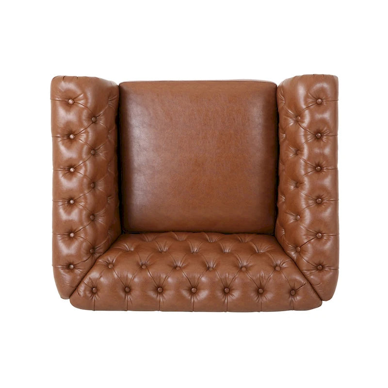 Sillón club de estilo Chesterfield con capitoné de botones, brazos enrollados y ribete de tachuelas