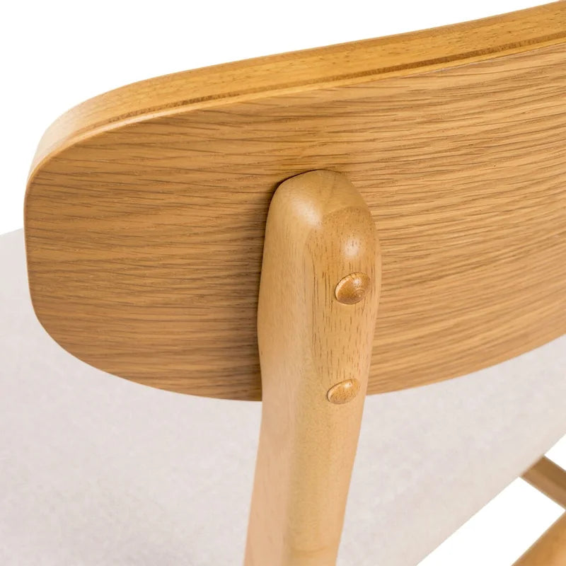 Silla de comedor tapizada de estilo moderno de mediados de siglo con patas de madera de caucho
